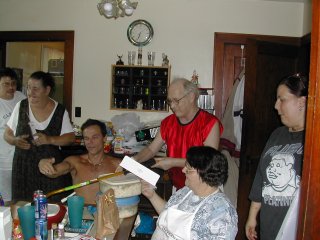 The Birthday Boy open his presents